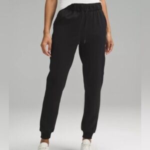Lululemon Black Stretch High Rise Joggers with Pockets Size 12